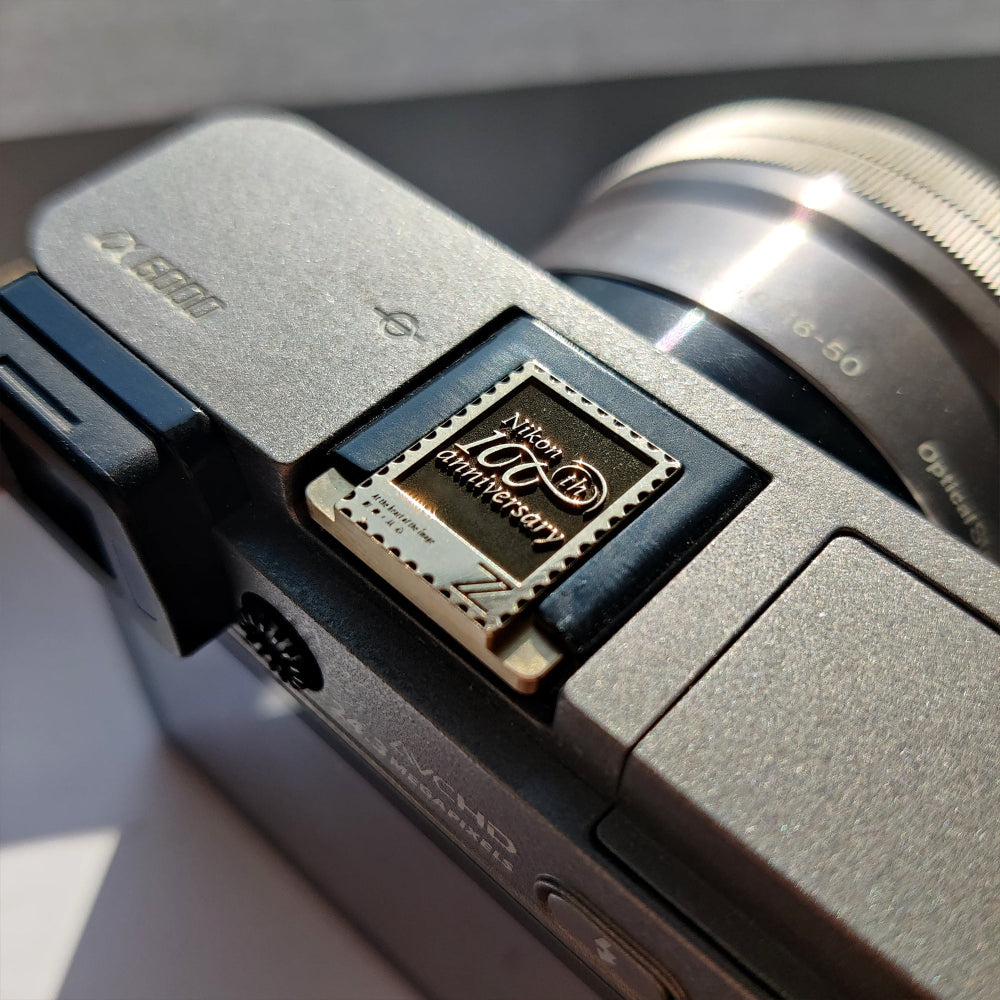 Nikon 100th anniversary - Gold Camera Hot Shoe Cover