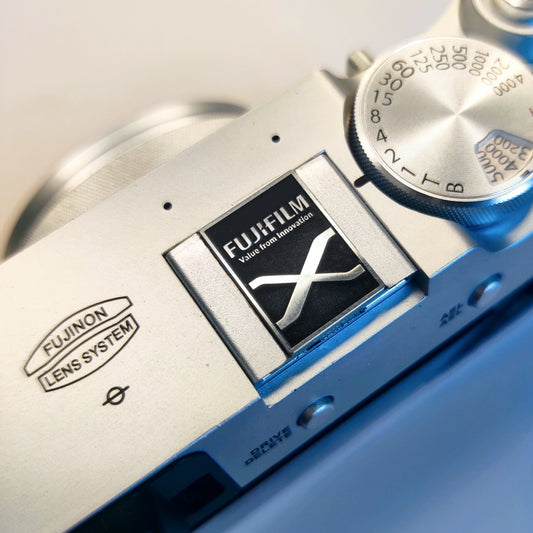fujifilm X logo hot shoe cover in silver base