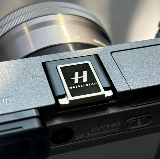 Hasselblad hot shoe cover silver on camera front view