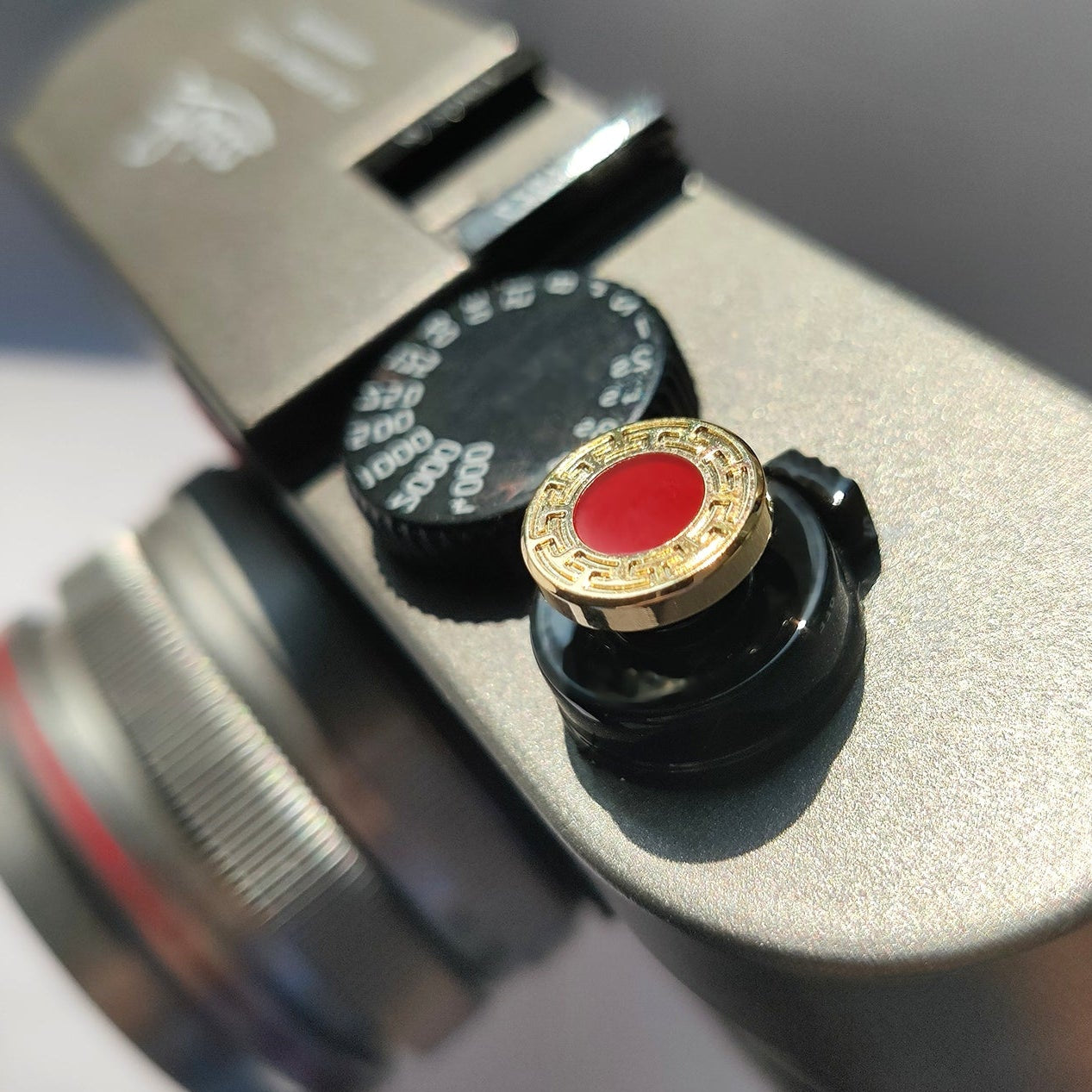 Red gem Leica shutter button